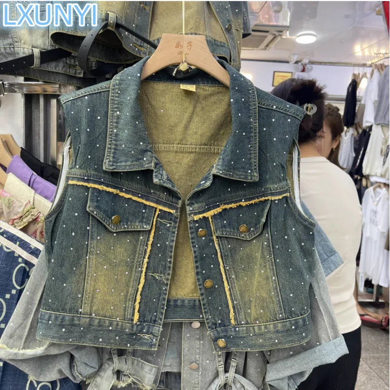 LXUNYI 2023 Summer New Diamond Denim Vest Cowboy Coat Jacket Loose Fringed Heavy Rhinestone Sleeveless Denim Vests Trend
LXUNYI 2023 Summer New Diamond Denim Vest Cowboy Coat Jacket Loose Fringed Heavy Rhinestone Sleeveless Denim Vests Trend