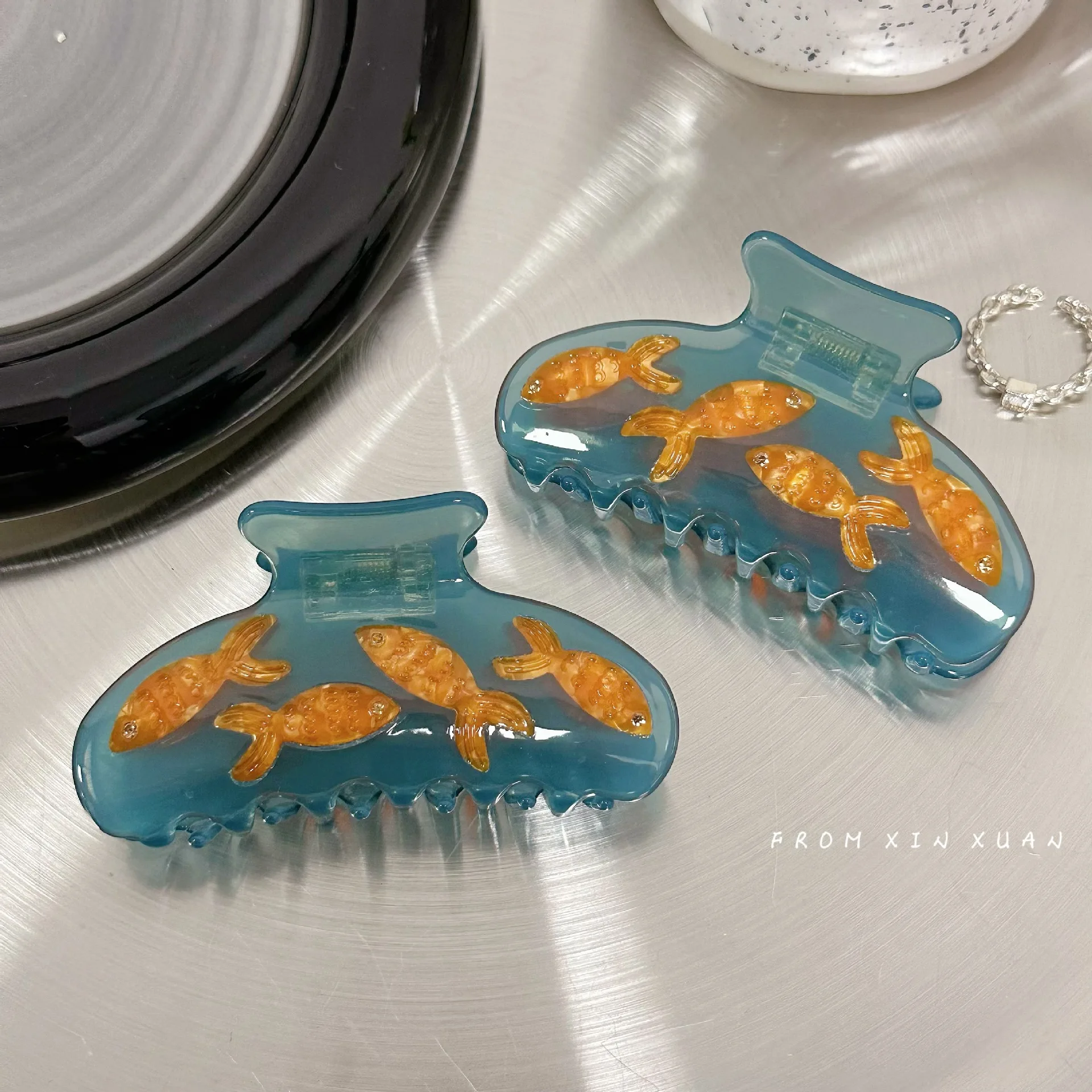 Cute Blue Transparent Goldfish Hair Claws Korean Y2k Girl Tongs Hairpin Large Claw Clip Oh Accessories for Sale Fashion Trend
Cute Blue Transparent Goldfish Hair Claws Korean Y2k Girl Tongs Hairpin Large Claw Clip Oh Accessories for Sale Fashion Trend