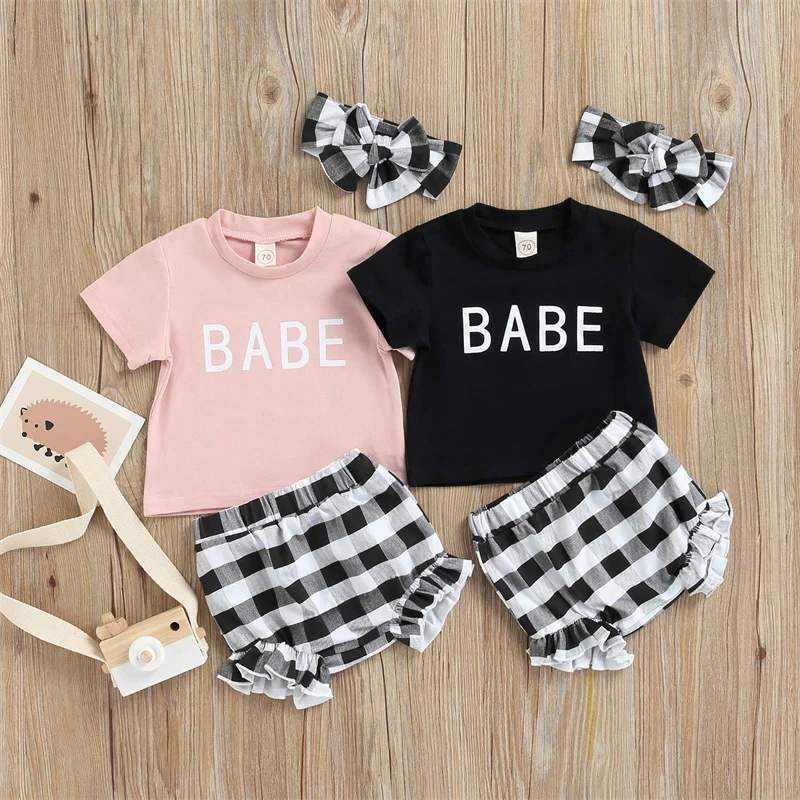 Baby Summer 3 Piece Set Letter Print Short Sleeve Round Neck T-shirts Tops + Plaid Ruffled High Waist Shorts + Hair Band
Baby Summer 3 Piece Set Letter Print Short Sleeve Round Neck T-shirts Tops + Plaid Ruffled High Waist Shorts + Hair Band
