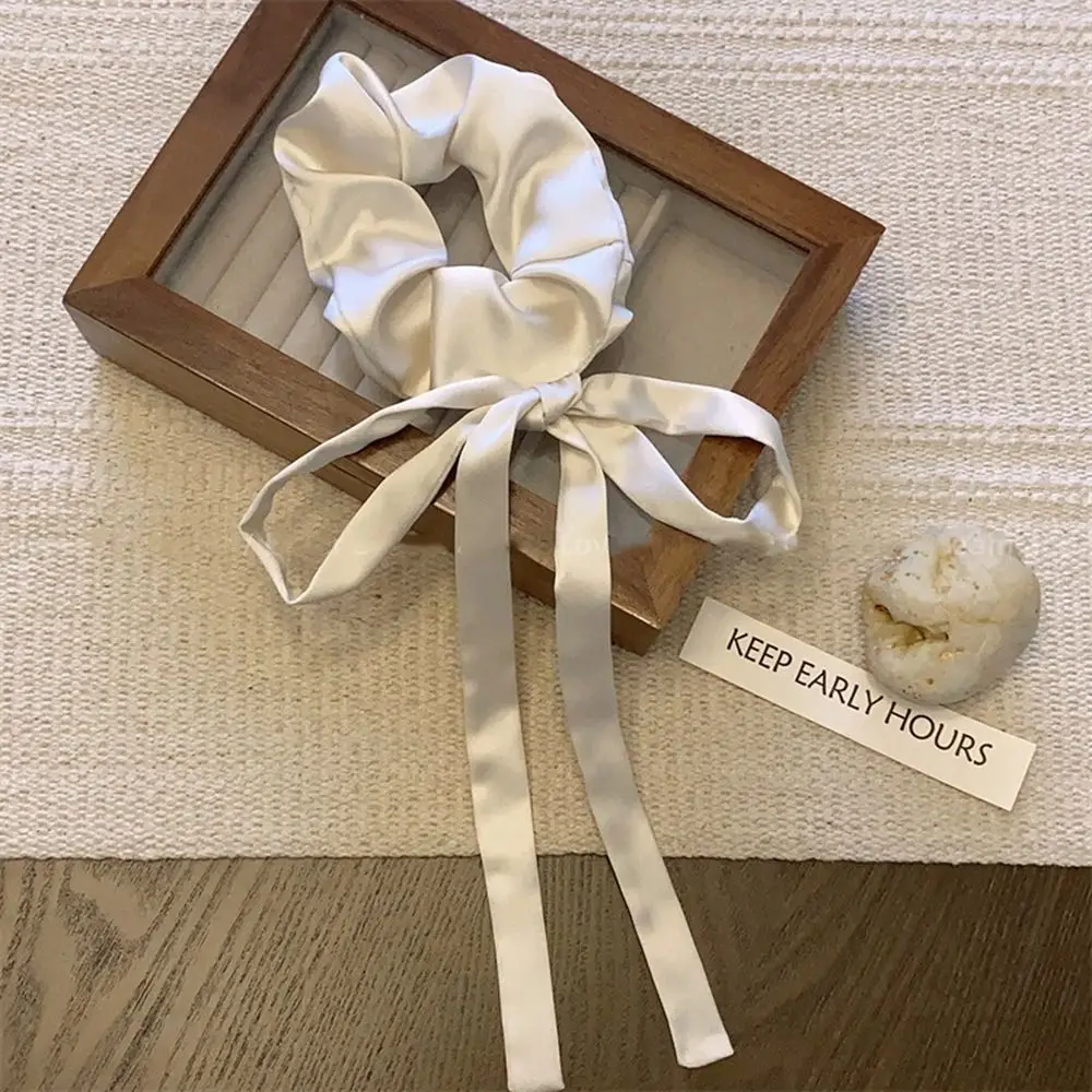 Женская атласная резинка для волос, с бантом, в Корейском стиле
Женская атласная резинка для волос, с бантом, в Корейском стиле