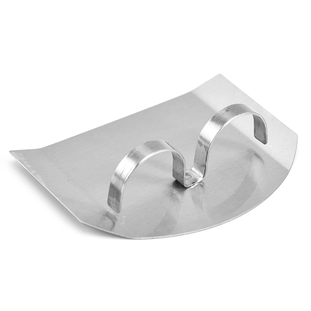 Stainless Steel Finger Protector Silver Cut-resistant Finger Guard Safe Fruits Vegetable Cutting Kitchen Gadgets 7.5*5.5*2cm
Stainless Steel Finger Protector Silver Cut-resistant Finger Guard Safe Fruits Vegetable Cutting Kitchen Gadgets 7.5*5.5*2cm