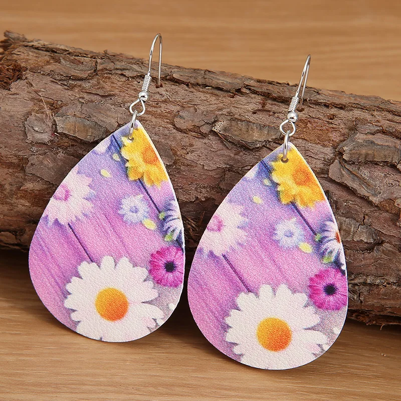 European and American New Drop-shaped Printed Daisy Sunflower Leather Earrings Small Fresh Double-sided Pu Earrings for Women
European and American New Drop-shaped Printed Daisy Sunflower Leather Earrings Small Fresh Double-sided Pu Earrings for Women