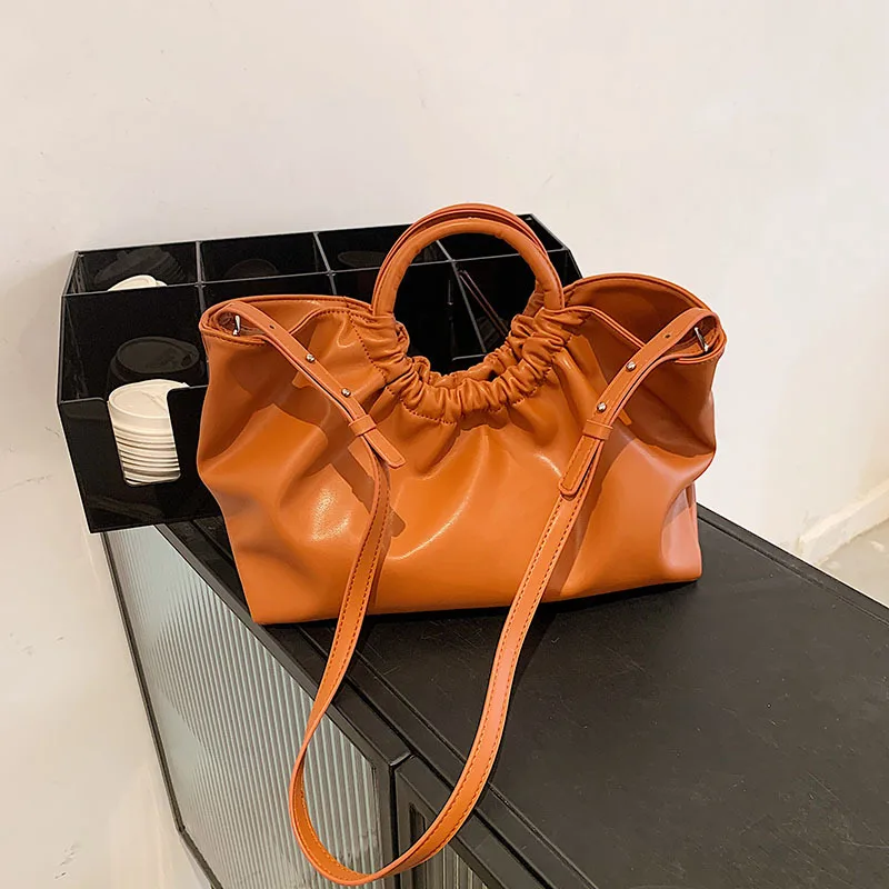 European and American Large-capacity Handbags 2021 Retro Simple High-quality Ladies Luxury One-shoulder Tote Bag Messenger Bag
European and American Large-capacity Handbags 2021 Retro Simple High-quality Ladies Luxury One-shoulder Tote Bag Messenger Bag