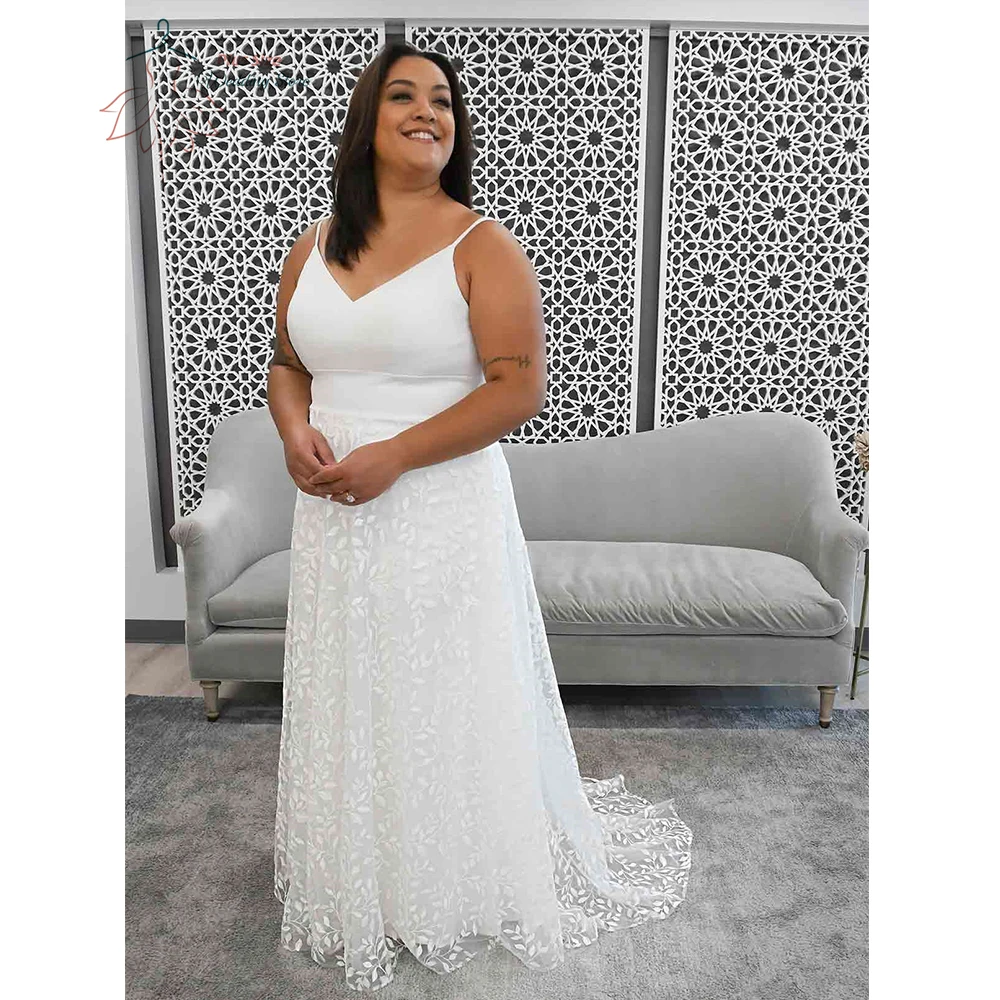 Elegant Wedding Dresses Plus Size Spaghetti Straps V-Neck Backless Bride Gown Lace Applique A-Line Sweep Train Robe De Mariée
Elegant Wedding Dresses Plus Size Spaghetti Straps V-Neck Backless Bride Gown Lace Applique A-Line Sweep Train Robe De Mariée