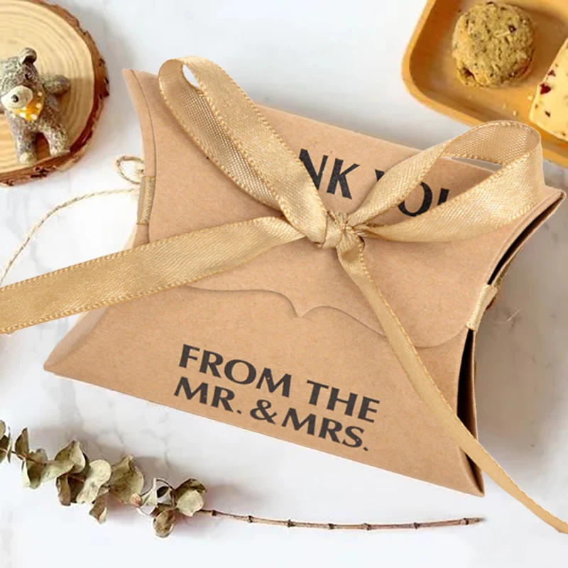 10PCS Kraft Paper Pillow Shape Candy Box With Ribbon Wedding Favors Gift Package Supplies Baby Shower Birthday Party Decorations
10PCS Kraft Paper Pillow Shape Candy Box With Ribbon Wedding Favors Gift Package Supplies Baby Shower Birthday Party Decorations