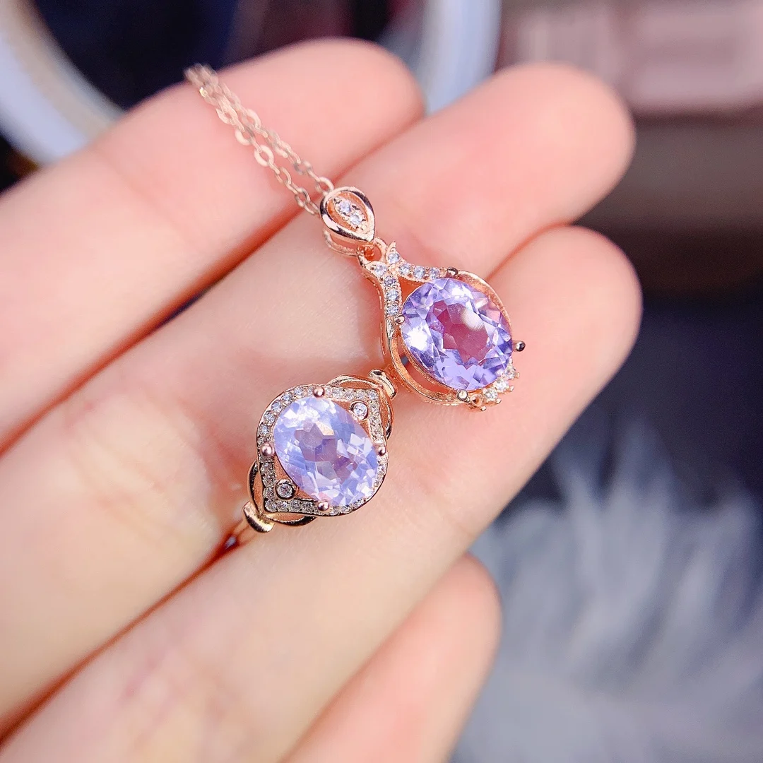 Овальное кольцо и ожерелье из серебра 925 пробы с натуральной лавандой 7x9 мм 
Овальное кольцо и ожерелье из серебра 925 пробы с натуральной лавандой 7x9 мм