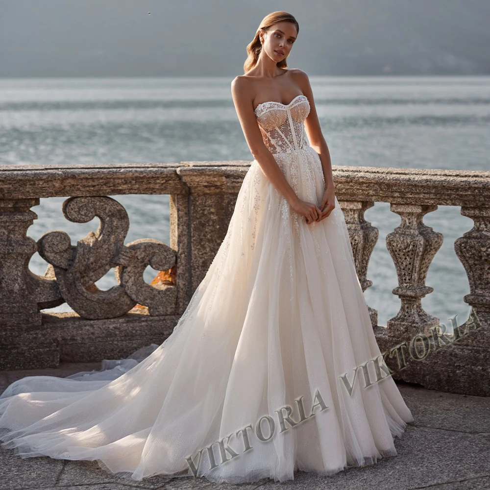 VIKTORIA Pleasant Wedding Dress Sweetheart Sleeveless Shiny Tulle For Woman Bridal A-LINE Appliques Vestidos De Novia Customised
VIKTORIA Pleasant Wedding Dress Sweetheart Sleeveless Shiny Tulle For Woman Bridal A-LINE Appliques Vestidos De Novia Customised