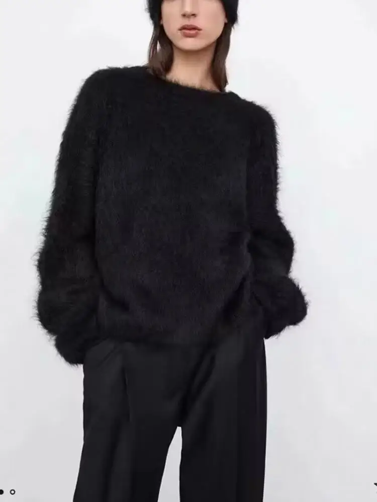 Женский трикотажный однотонный пуловер с круглым вырезом и длинными рукавами
Женский трикотажный однотонный пуловер с круглым вырезом и длинными рукавами