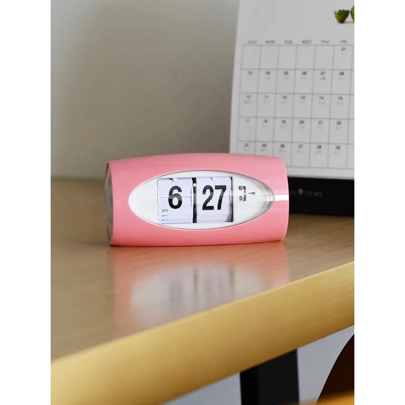 Nordic simple and lovely page-turning alarm clock children's clock living room modern creative clocks desktop desk clock. 
Nordic simple and lovely page-turning alarm clock children's clock living room modern creative clocks desktop desk clock.
