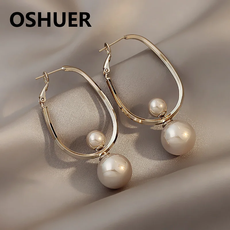 Классические гладкие металлические жемчужные серьги OSHUER из сплава, серьги-кольца для женщин, характерные повседневные серьги для девочек
Классические гладкие металлические жемчужные серьги OSHUER из сплава, серьги-кольца для женщин, характерные повседневные серьги для девочек