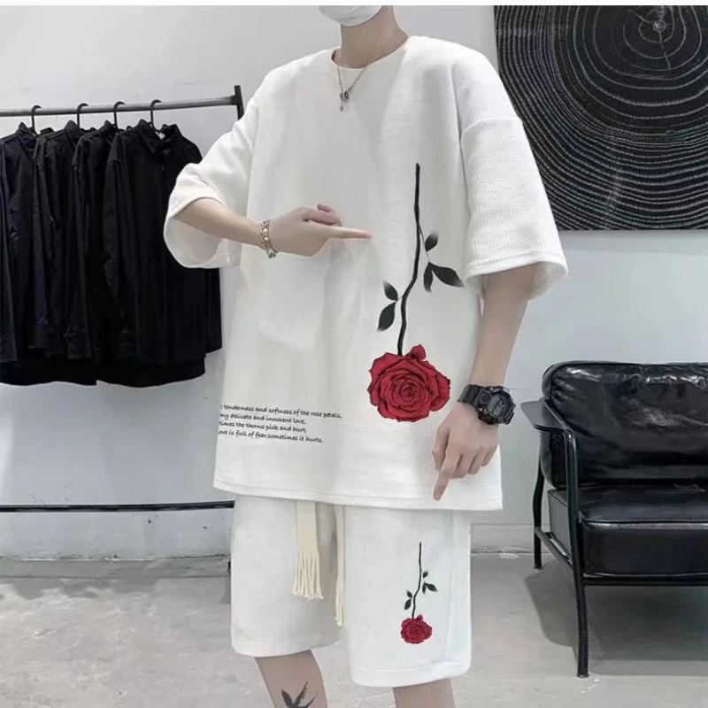 Korean Fashion Streetwear Hip Hop Rock Casual Short Suit Rose Flower Tshirts Shorts 2 Piece Set Summer Tracksuit Clothes for Men
Korean Fashion Streetwear Hip Hop Rock Casual Short Suit Rose Flower Tshirts Shorts 2 Piece Set Summer Tracksuit Clothes for Men