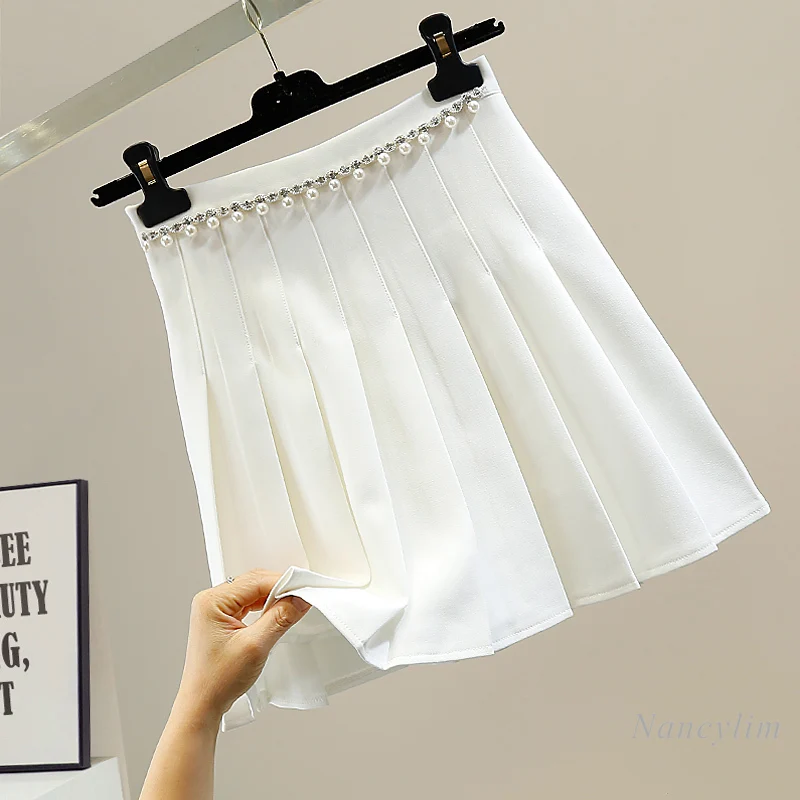 Весенние белые юбки, женские модные юбки с бусинами, а-силуэт, с завышенной талией, плиссированные юбки для студентов
Весенние белые юбки, женские модные юбки с бусинами, а-силуэт, с завышенной талией, плиссированные юбки для студентов