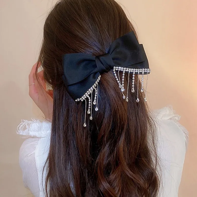 Korea New Black Hairpin Bow Tassel Rhinestone Spring Clip Sweet Hairpin for Girl Banquet Temperament Hair Accessories
Korea New Black Hairpin Bow Tassel Rhinestone Spring Clip Sweet Hairpin for Girl Banquet Temperament Hair Accessories