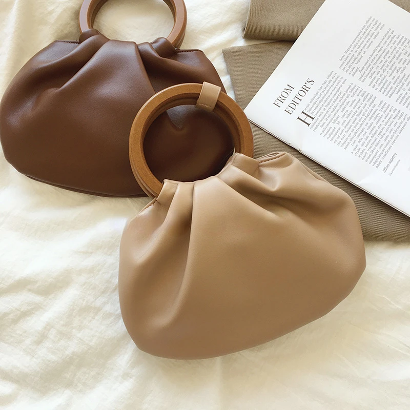 Korean Ins Vintage Wooden Handle Handbag Pleated Cloud Bag Crossbody Small Bag Shoulder Bag Textured Women's Bag Tide
Korean Ins Vintage Wooden Handle Handbag Pleated Cloud Bag Crossbody Small Bag Shoulder Bag Textured Women's Bag Tide