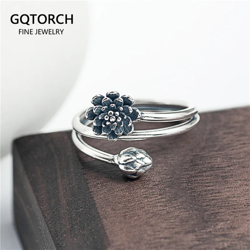 Женские винтажные кольца с лотосом, открытые колечки из тайского серебра 100% пробы с изменяемым размером, модные ювелирные украшения
Женские винтажные кольца с лотосом, открытые колечки из тайского серебра 100% пробы с изменяемым размером, модные ювелирные украшения