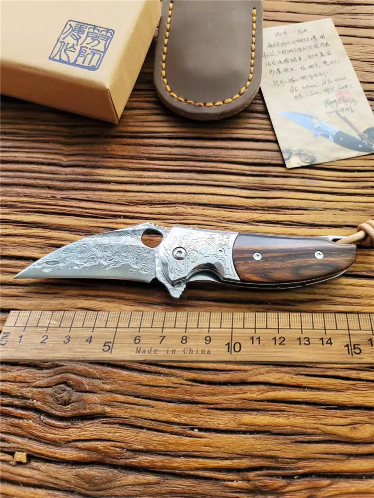 Damascus Steel Folding Knife VG10 Blade Wooden Handle Camping Outdoor Survival Hunting Knife Sharp High Hardness Tactical Tool
Damascus Steel Folding Knife VG10 Blade Wooden Handle Camping Outdoor Survival Hunting Knife Sharp High Hardness Tactical Tool