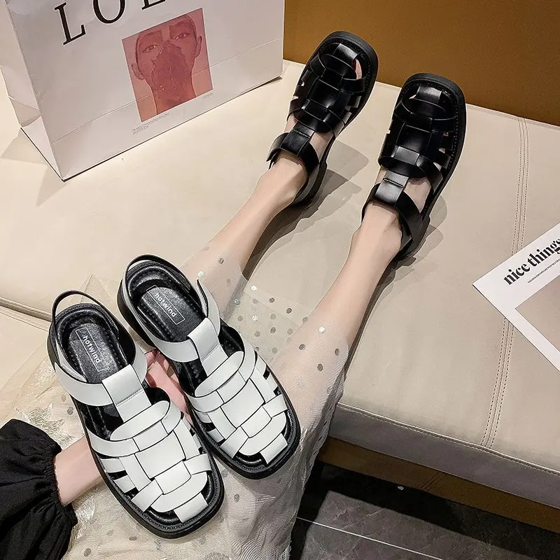 Roman Sandals Women Round Toe One-Word Buckle Baotou White House Shoes Woman Fashion New PU Weave Black Flat Summer Sandal 
Roman Sandals Women Round Toe One-Word Buckle Baotou White House Shoes Woman Fashion New PU Weave Black Flat Summer Sandal