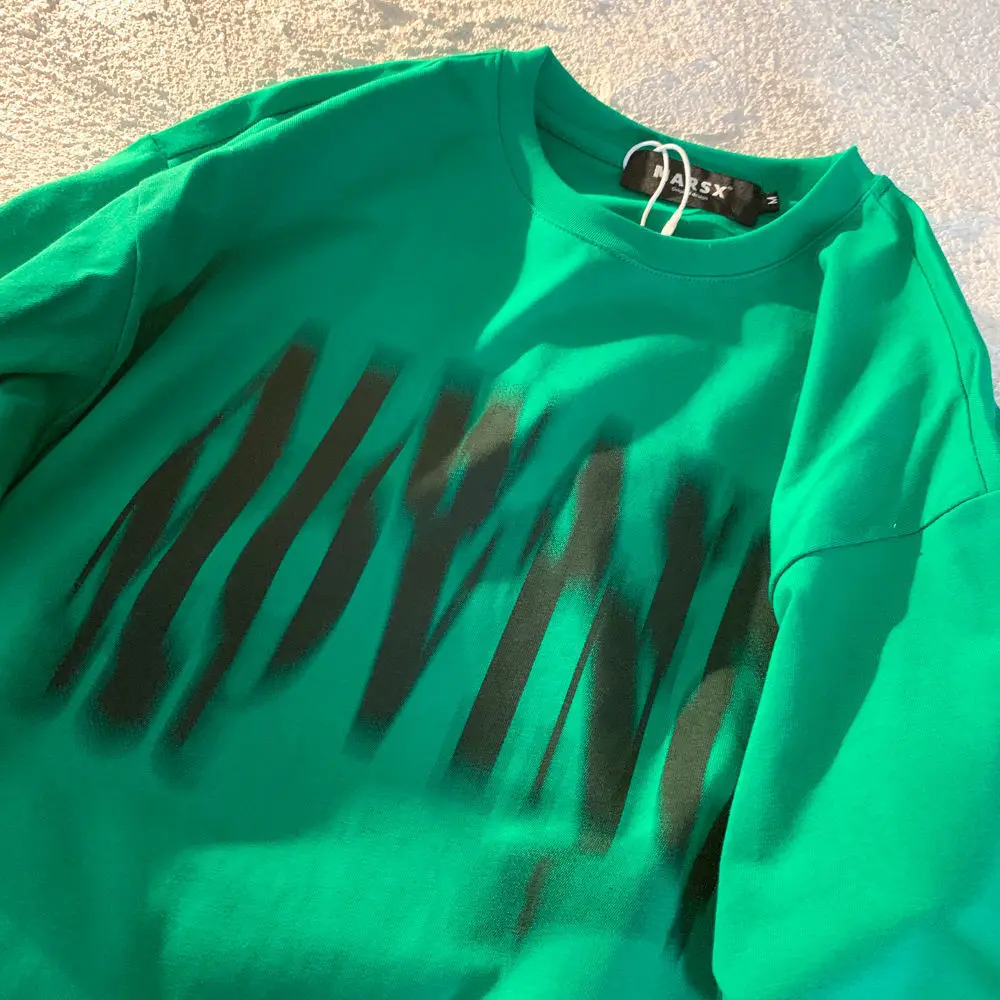 100% Cotton Phantom Letter Printing Loose Short Sleeve Green T-shirt Men Women Casual Students Tshirt 2022 Summer Korean Fashion
100% Cotton Phantom Letter Printing Loose Short Sleeve Green T-shirt Men Women Casual Students Tshirt 2022 Summer Korean Fashion