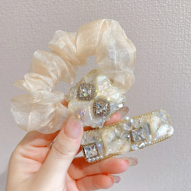 New Korean High-end Rhinestones Bangs Broken Hair BB Clip Sweet Large Intestine Ring Girl's Head Rope Haar Accessoires
New Korean High-end Rhinestones Bangs Broken Hair BB Clip Sweet Large Intestine Ring Girl's Head Rope Haar Accessoires