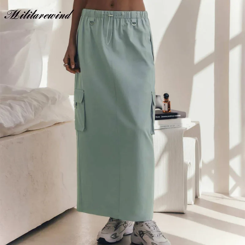 Женская хлопковая юбка с высокой талией, Повседневная Однотонная юбка в уличном стиле с эластичным поясом и карманами, лето 2023
Женская хлопковая юбка с высокой талией, Повседневная Однотонная юбка в уличном стиле с эластичным поясом и карманами, лето 2023