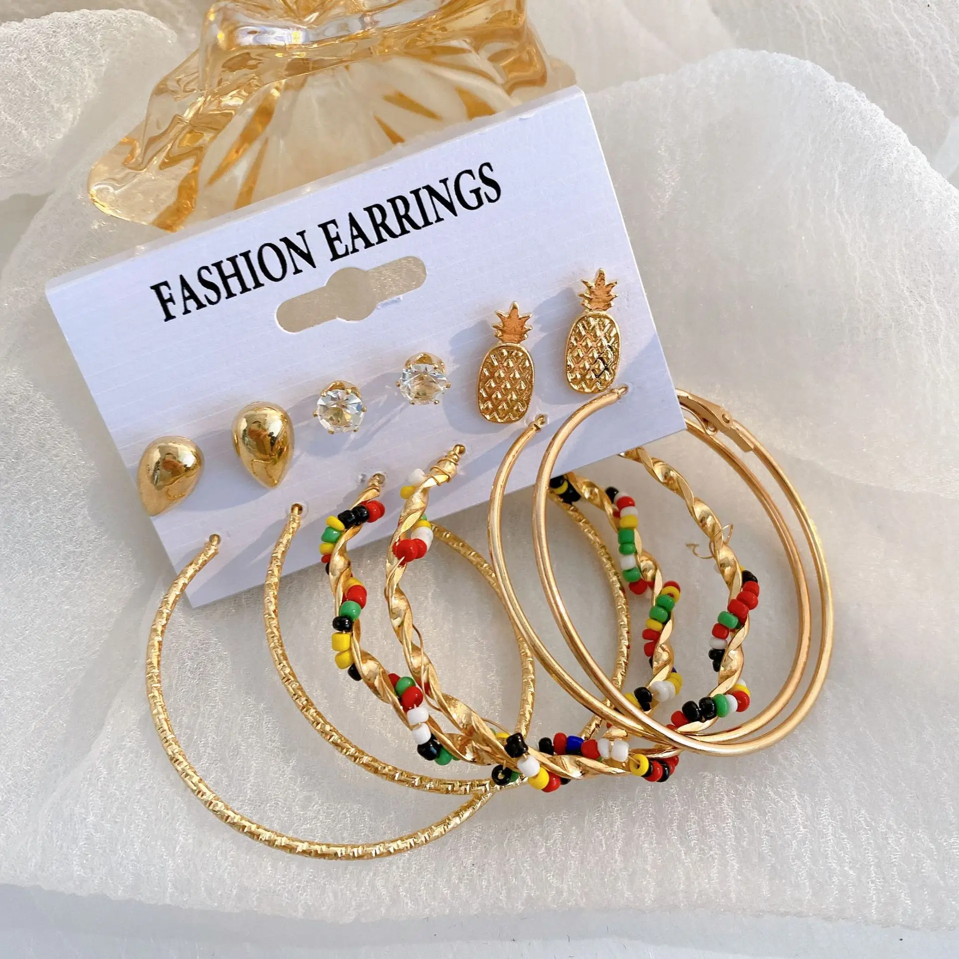 New Pineapple Diamond-studded Earrings Wrapped Around Colored Rice Beads Circle Earrings Set Combination Girl Jewelry Gift 
New Pineapple Diamond-studded Earrings Wrapped Around Colored Rice Beads Circle Earrings Set Combination Girl Jewelry Gift