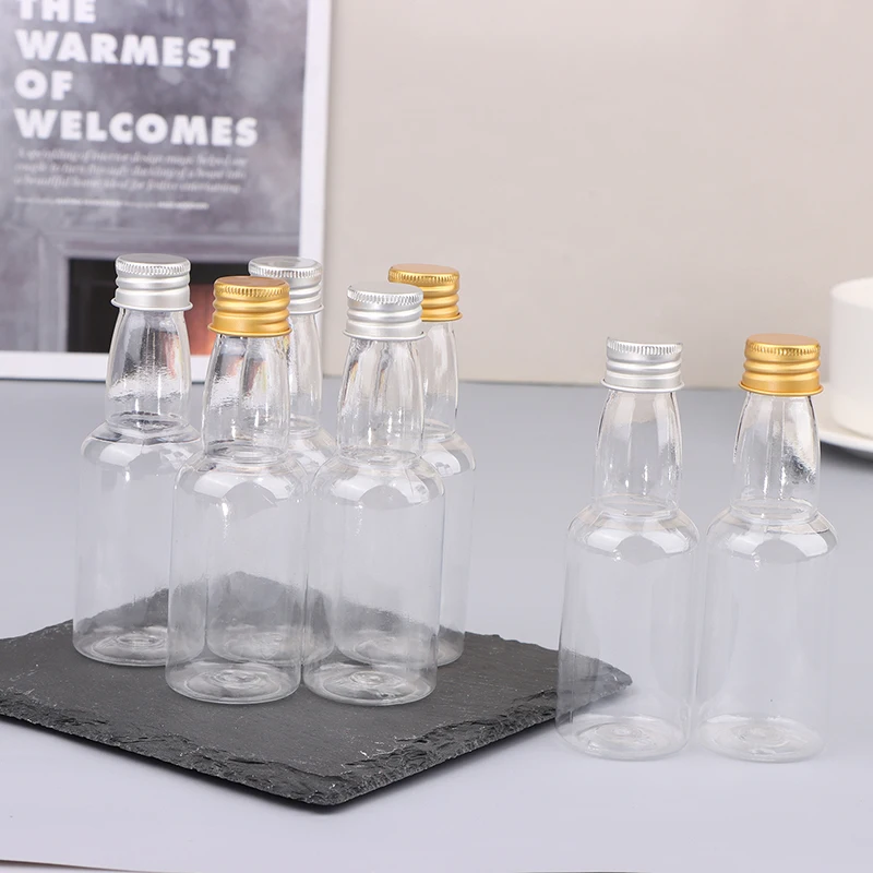 10Pcs 50ml Mini Clear PET Refillable Small Wine Bottles For Party Wedding Liquor Bottles With Leak Proof Screw Lid
10Pcs 50ml Mini Clear PET Refillable Small Wine Bottles For Party Wedding Liquor Bottles With Leak Proof Screw Lid