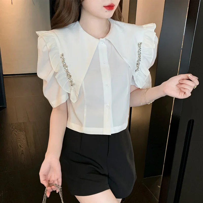 White Blouse Beading Women Blouse Summer New Casual Fashion Short Sleeve Tops Peter Pan Collar Shirt Ruffles Solid Tops
White Blouse Beading Women Blouse Summer New Casual Fashion Short Sleeve Tops Peter Pan Collar Shirt Ruffles Solid Tops