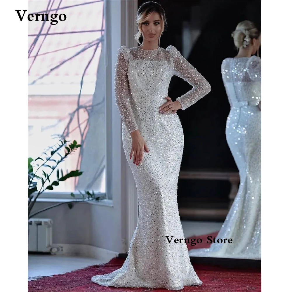Verngo Modest Sparkly Lace Sequined Mermaid Wedding Dresses Long Sleeves Jewel Neck Pearls Button Dubai Women Back Bridal Gowns
Verngo Modest Sparkly Lace Sequined Mermaid Wedding Dresses Long Sleeves Jewel Neck Pearls Button Dubai Women Back Bridal Gowns