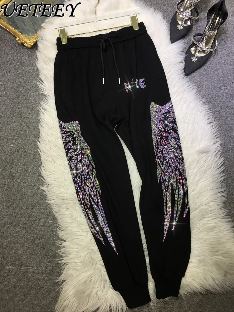 Heavy Rhinestone Sweatpants Men Women Wings Luxury Ankle-Tied Sports Casual Pants Spring Autumn Summer New Long Trousers Female
Heavy Rhinestone Sweatpants Men Women Wings Luxury Ankle-Tied Sports Casual Pants Spring Autumn Summer New Long Trousers Female