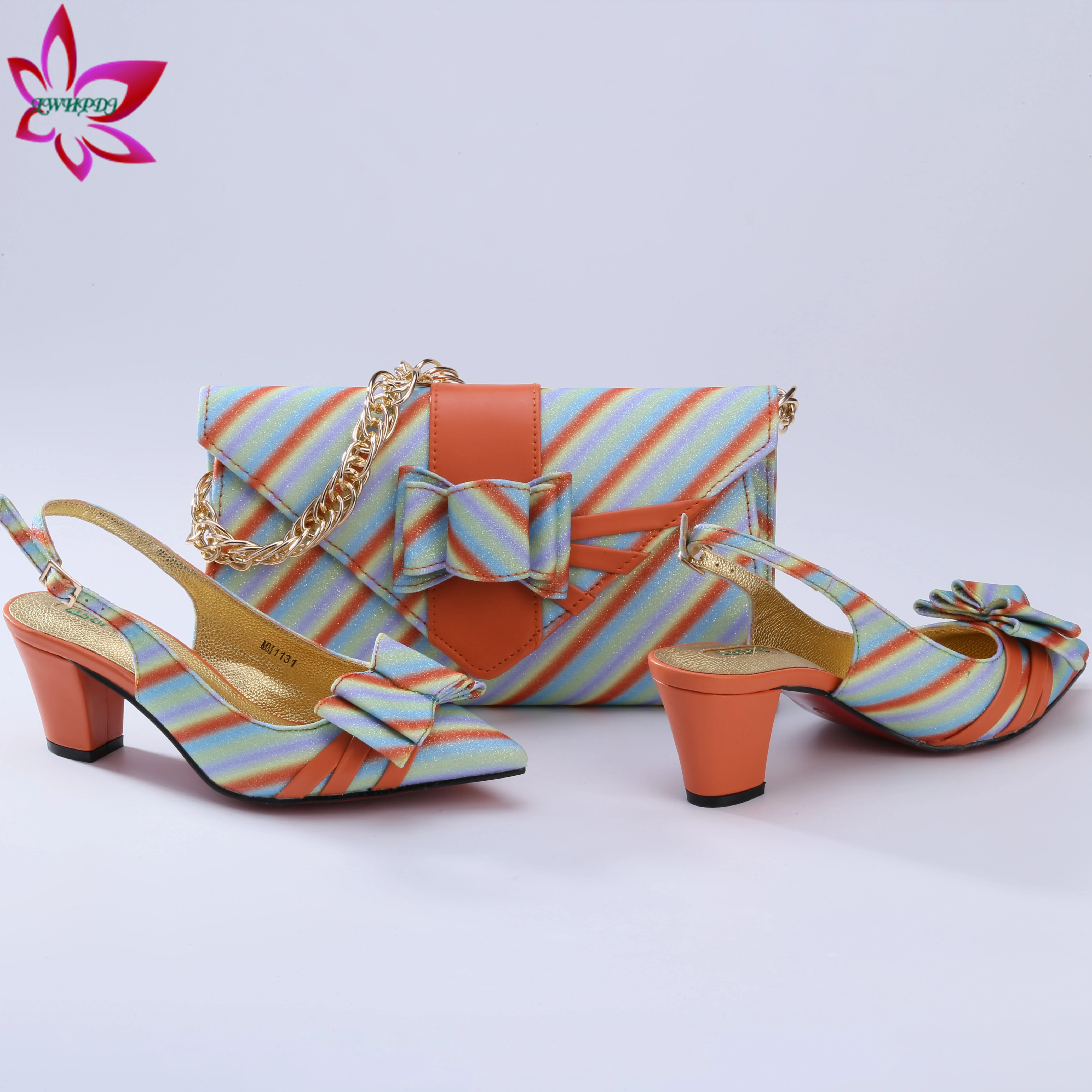 Orange Color Nigerian Women Mixed Colors Design Shoes Matching Bag Set for Mature Ladies Offices Talking 
Orange Color Nigerian Women Mixed Colors Design Shoes Matching Bag Set for Mature Ladies Offices Talking