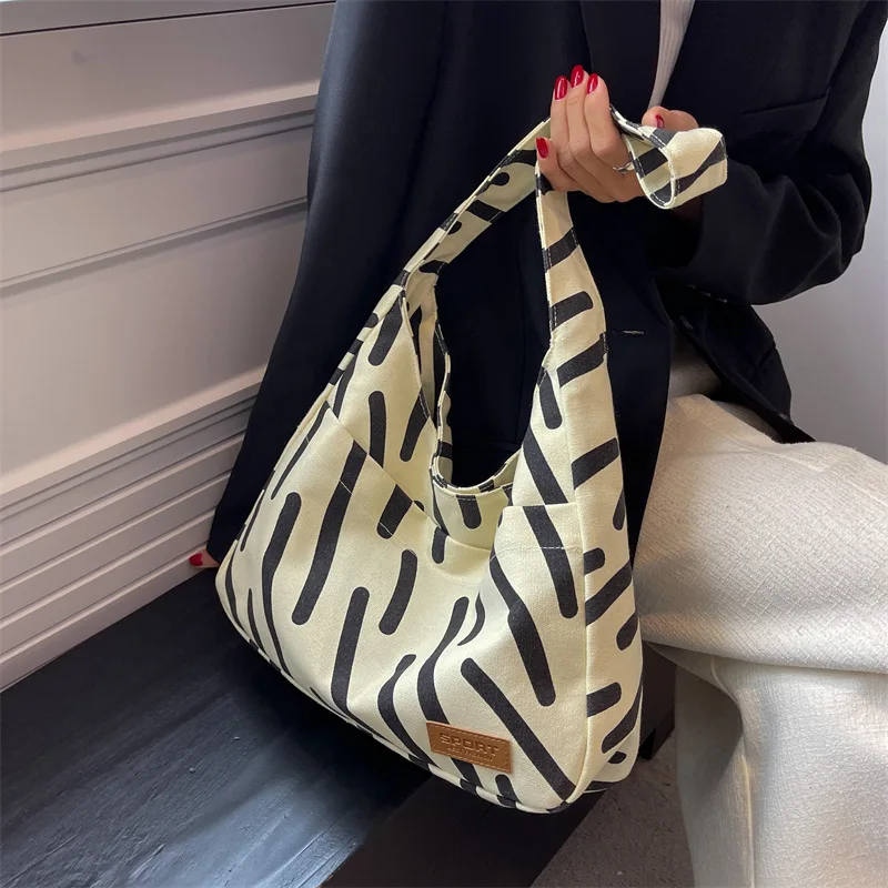 Zebra Pattern Shoulder Bag Women 2022 New Trendy Fashion Preppy Style Canvas Bag Large Capacity Tote Bag crossbody bag for women
Zebra Pattern Shoulder Bag Women 2022 New Trendy Fashion Preppy Style Canvas Bag Large Capacity Tote Bag crossbody bag for women