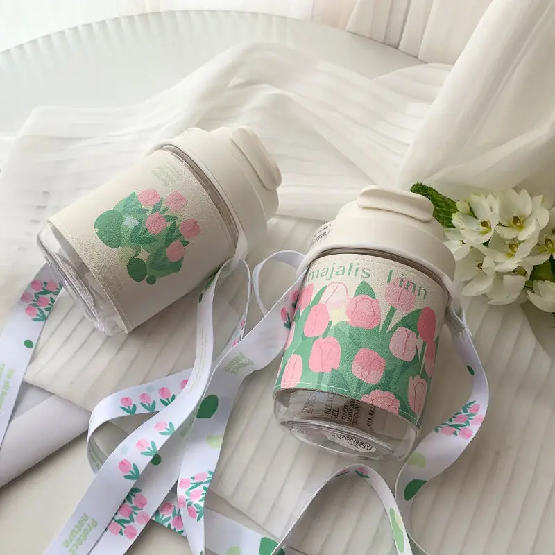 Darling Family Original 450ML Tulip Coffee Cup Outdoor Sports Water Bottle with Straw Strap Creative Portable Plastic Sippy Cup
Darling Family Original 450ML Tulip Coffee Cup Outdoor Sports Water Bottle with Straw Strap Creative Portable Plastic Sippy Cup