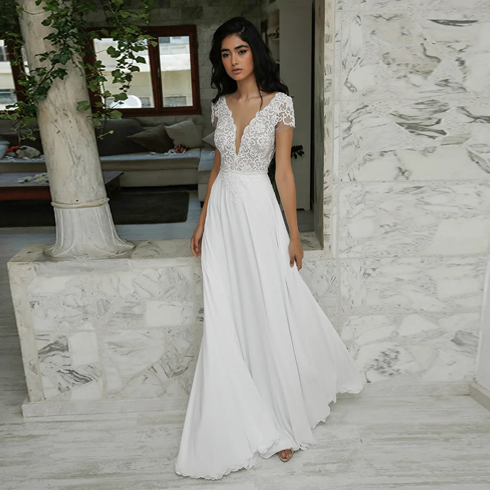 Simple V-Neck Floral Pattern Lace Appliques A-Line Wedding Dress For Bride 2022 Backless Button Decoration Tulle Robe De Mariée
Simple V-Neck Floral Pattern Lace Appliques A-Line Wedding Dress For Bride 2022 Backless Button Decoration Tulle Robe De Mariée