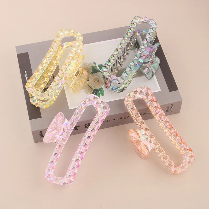 New Lingge 13CM Oversized Shark Clip Gradient Candy Color Hollow Clip Clip Female High-end Korean Style Hairstyle
New Lingge 13CM Oversized Shark Clip Gradient Candy Color Hollow Clip Clip Female High-end Korean Style Hairstyle