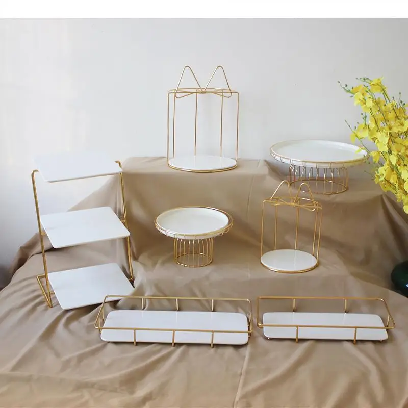 Golden Wrought Iron Dessert Table Cake Stand White Ceramics Fruit Tray Three-tier Snack Rack High Foot Display Stand Cake Pan
Golden Wrought Iron Dessert Table Cake Stand White Ceramics Fruit Tray Three-tier Snack Rack High Foot Display Stand Cake Pan