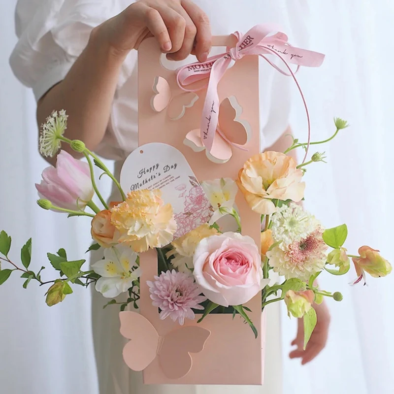 Bouquet Tote Box Butterfly Hollow Out Handle Basket Wrapping Paper Flower Arrangement Box Valentine Party Gift Packing Boxes
Bouquet Tote Box Butterfly Hollow Out Handle Basket Wrapping Paper Flower Arrangement Box Valentine Party Gift Packing Boxes