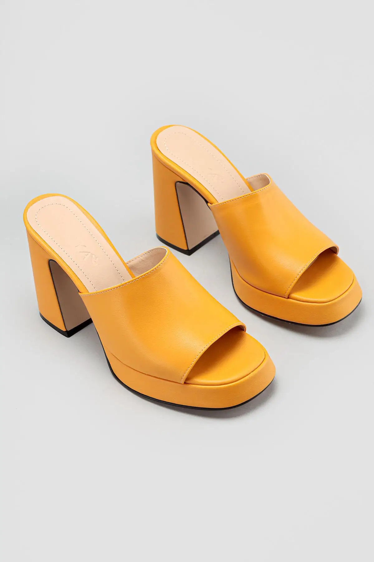 Women Mustard Aviva Heels Slippers
Women Mustard Aviva Heels Slippers
