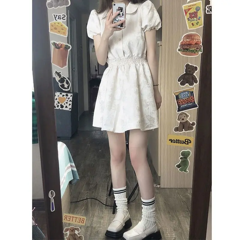 French Retro White Bubble Sleeved Dress for Women in Summer, with a Slim Waist Design and a Sense of Niche. Short Skirt for Smal
French Retro White Bubble Sleeved Dress for Women in Summer, with a Slim Waist Design and a Sense of Niche. Short Skirt for Smal