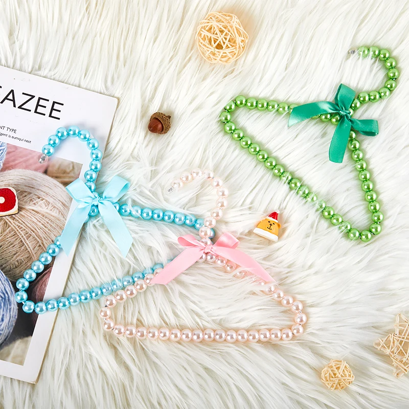 1pc Baby Hangers For Clothes Kids Pet Pearl Plastic Child Clothes Rack Pet Dog Cat Clothes Pearl Hanger Wardrobe Baby Coat Rack
1pc Baby Hangers For Clothes Kids Pet Pearl Plastic Child Clothes Rack Pet Dog Cat Clothes Pearl Hanger Wardrobe Baby Coat Rack
