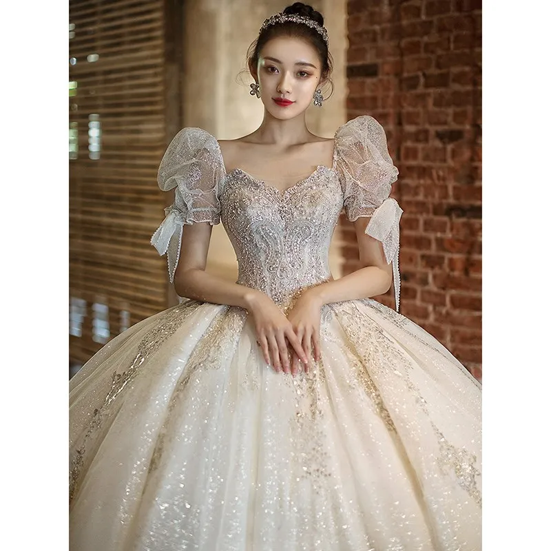 Luxury Wedding Dress 2022 New Short Sleeve Embroidered Tulle Ball Gown Wedding Gowns Shinny Princess
Luxury Wedding Dress 2022 New Short Sleeve Embroidered Tulle Ball Gown Wedding Gowns Shinny Princess