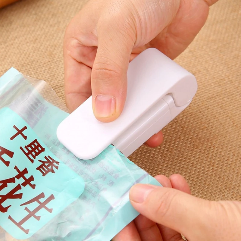 Portable Bag Heat Sealer Plastic Package Storage Bag Clip Mini Sealing Machine Handy Sticker Seal for Food Snack Kitchen Gadgets
Portable Bag Heat Sealer Plastic Package Storage Bag Clip Mini Sealing Machine Handy Sticker Seal for Food Snack Kitchen Gadgets