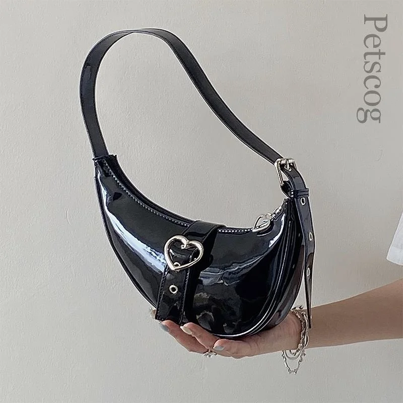 Полумесячная женская сумка для подмышек, глянцевая лакированная кожа, крутые сумки на плечо для девушек с застежкой в виде сердца, роскошные дизайнерские женские сумки
Полумесячная женская сумка для подмышек, глянцевая лакированная кожа, крутые сумки на плечо для девушек с застежкой в виде сердца, роскошные дизайнерские женские сумки
