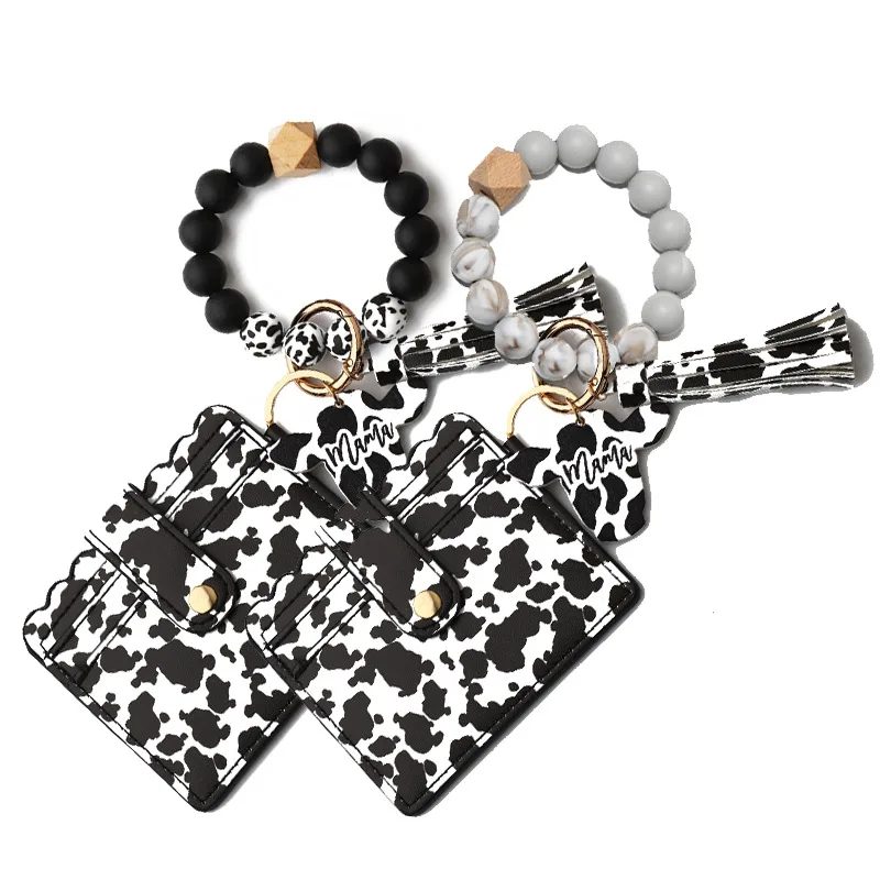 Cursive Cow Initial Wristlet keychain with PU wallet cow print Mama Bangle keychain Silicon Bangle Keyring Custom charms Gift
Cursive Cow Initial Wristlet keychain with PU wallet cow print Mama Bangle keychain Silicon Bangle Keyring Custom charms Gift