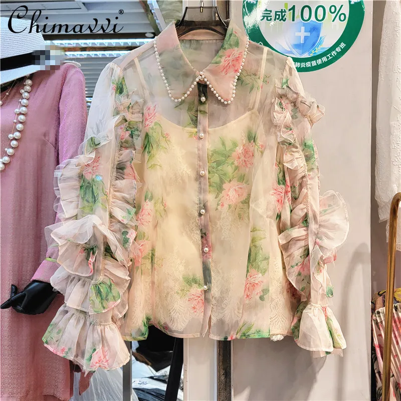 European 2022 Spring Summer New Ladies Pearl Collar Organza Printed Blouses Women Fashion Sweet Mesh Lace Transparent Shirt Top 
European 2022 Spring Summer New Ladies Pearl Collar Organza Printed Blouses Women Fashion Sweet Mesh Lace Transparent Shirt Top