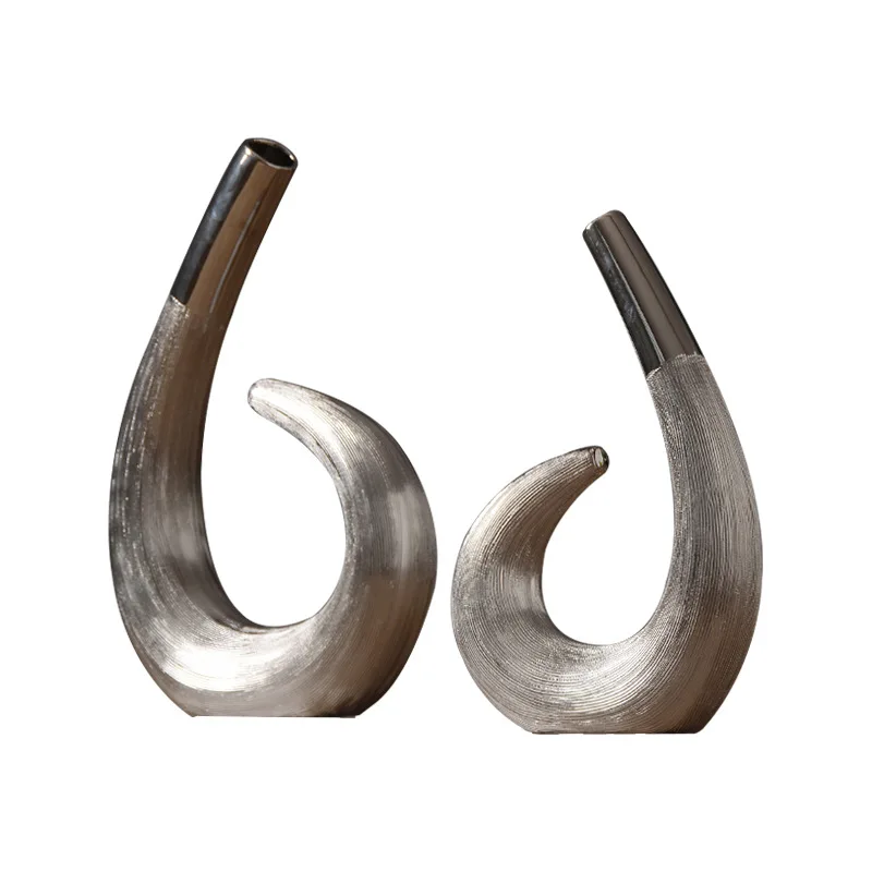 Nordic art silver curved bottle decoration home decoration ceramic creative living room TV cabinet wine cabinet decoration
Nordic art silver curved bottle decoration home decoration ceramic creative living room TV cabinet wine cabinet decoration