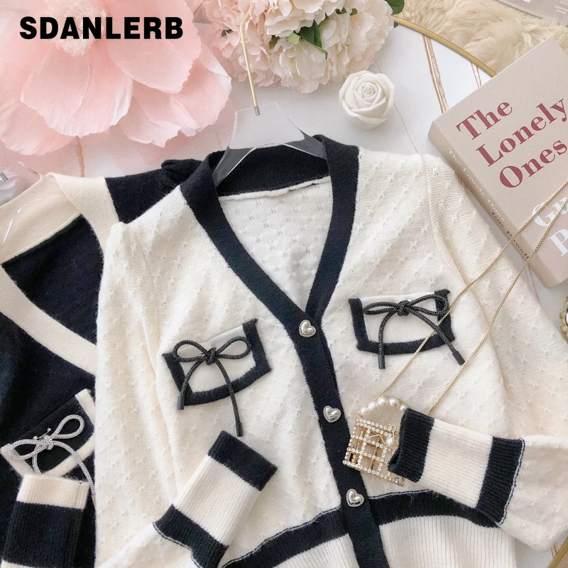 Retro Contrast Color V-neck Knitted Coat Bow Gentle Short Temperamental Long Sleeve All-matching Cardigan Sweater for Women
Retro Contrast Color V-neck Knitted Coat Bow Gentle Short Temperamental Long Sleeve All-matching Cardigan Sweater for Women