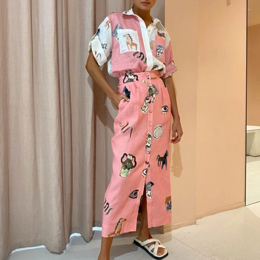 2022 Summer High Quality Linen Pink White Spliced Cartoon Print Embroidery Pocket Shirt Midi Skirt Women Ease Matching Set
2022 Summer High Quality Linen Pink White Spliced Cartoon Print Embroidery Pocket Shirt Midi Skirt Women Ease Matching Set