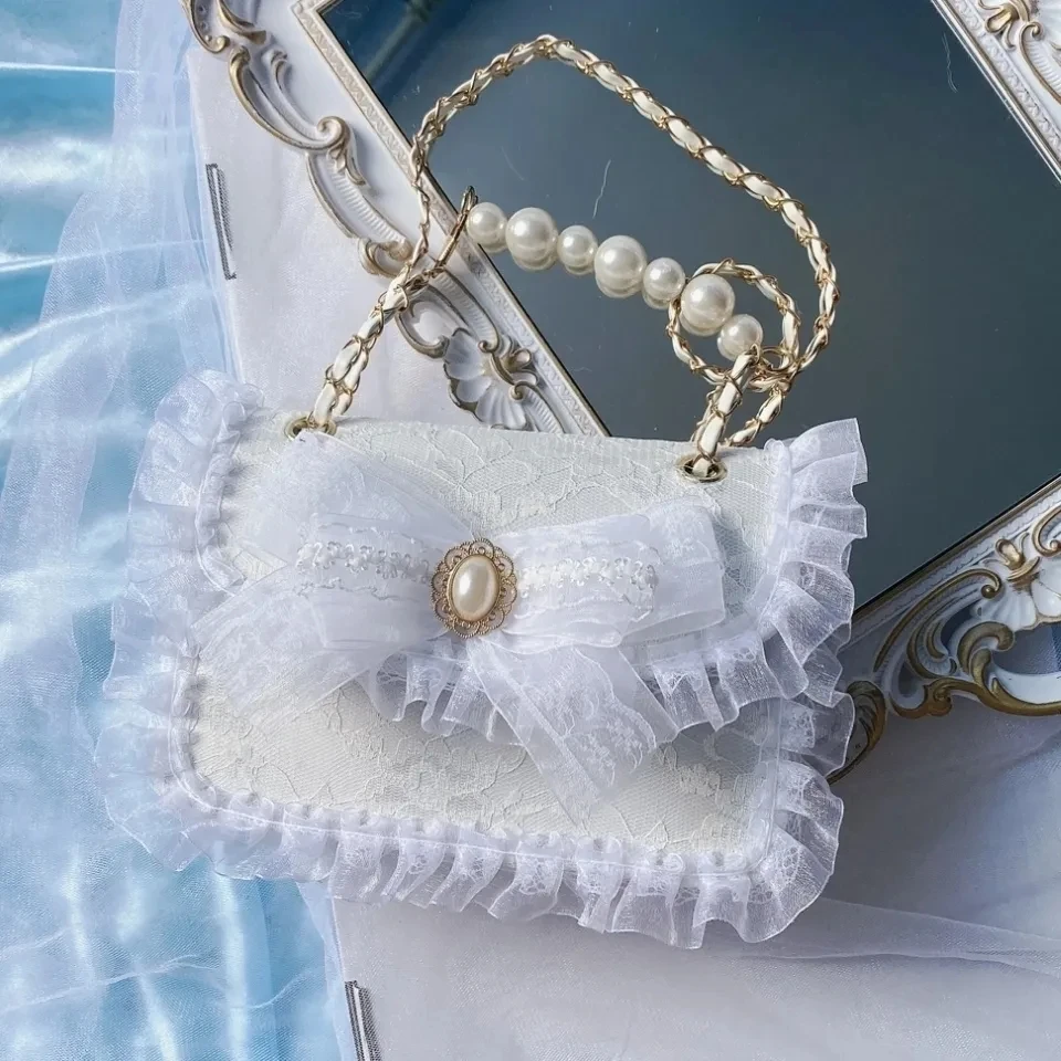 Retro Court Lolita Cosplay Elegant Princess Tea Party Gentle Girl Lace Gorgeous Pearl Bow Flower Embroidery Ribbon Handbag
Retro Court Lolita Cosplay Elegant Princess Tea Party Gentle Girl Lace Gorgeous Pearl Bow Flower Embroidery Ribbon Handbag