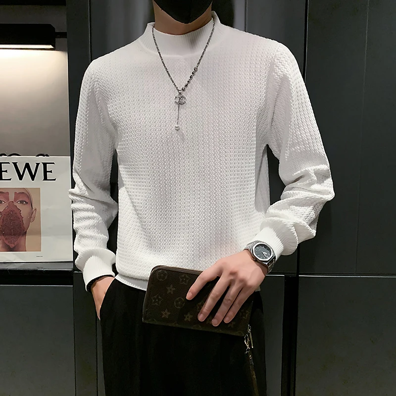 Solid color half-high collar bottom shirt Men's loose and versatile knitted sweater in autumn and winter 
Solid color half-high collar bottom shirt Men's loose and versatile knitted sweater in autumn and winter