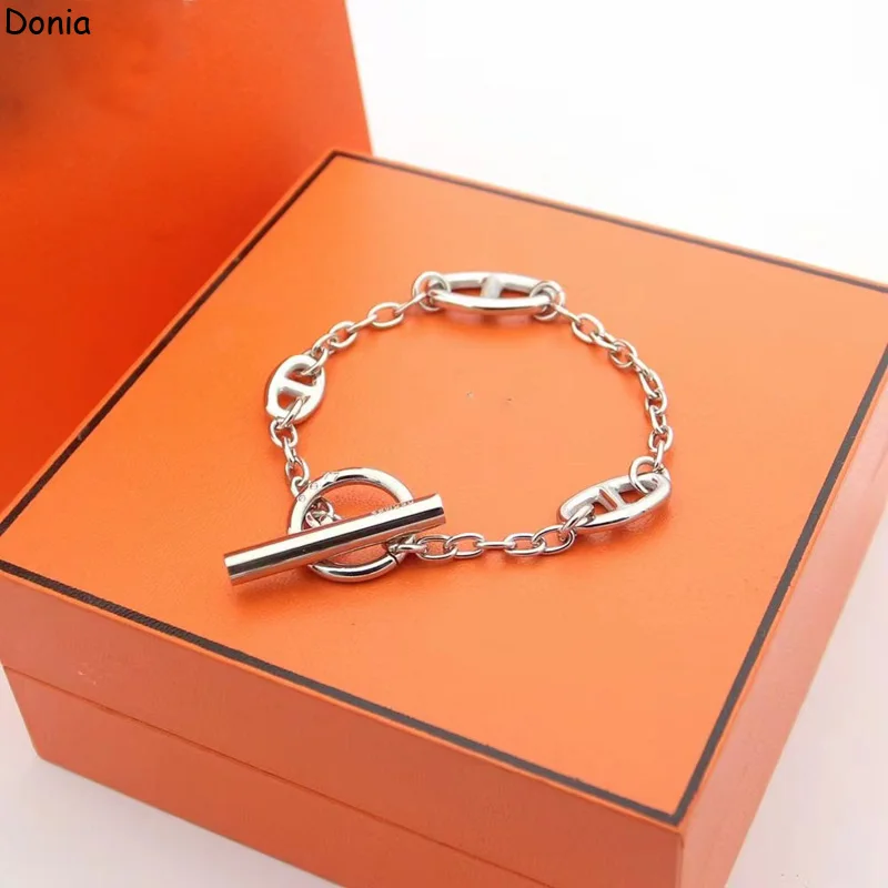 

Donia Jewelry New Fashion Pig Nose Smooth Titanium OT Buckle Palace Luxury Retro Bracelet.